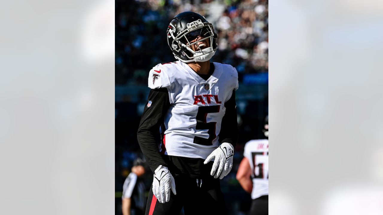 Atlanta Falcons wide receiver Drake London (5) walks off the field