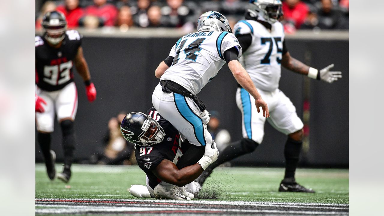 ATLANTA, GA - OCTOBER 31: Sam Darnold #14 of the Carolina Panthers warms  before the Week 8 NFL game between the Atlanta Falcons and the Carolina  Panthers on October 31, 2021 at