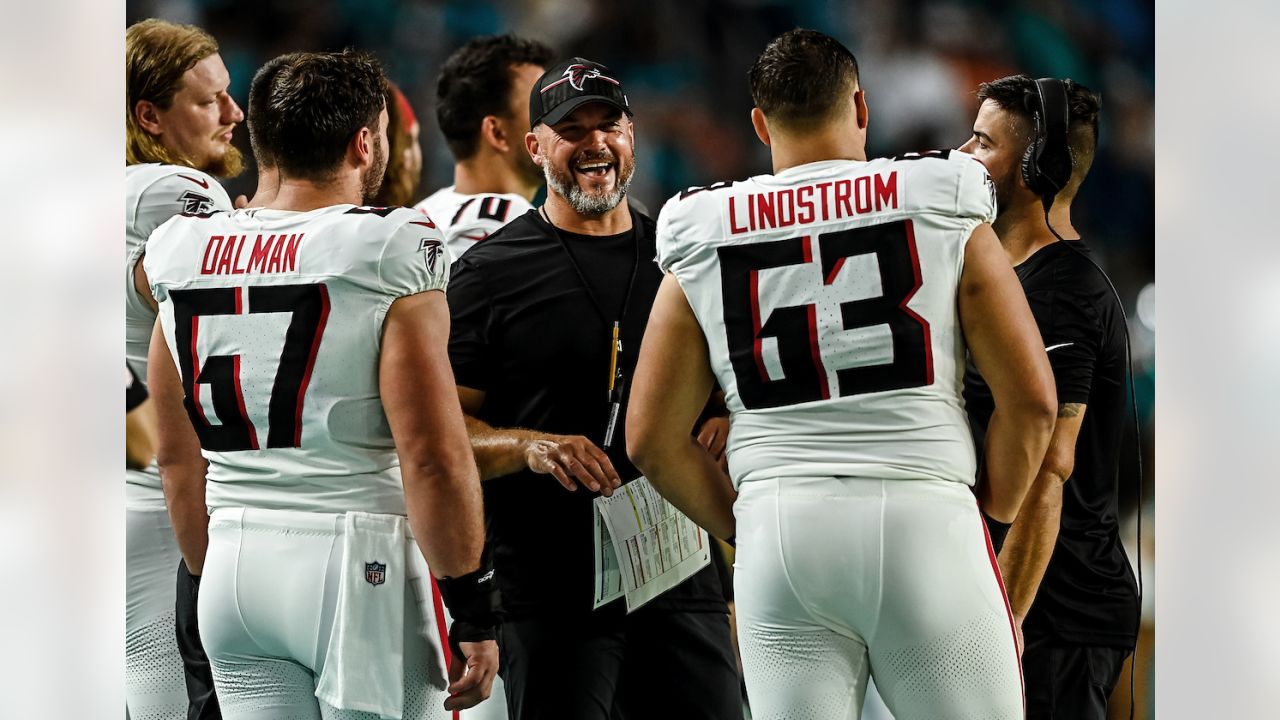 Atlanta Falcons quarterback Logan Woodside (11) runs with the ball against  the Miami Dolphins during an NFL pre-season football game, Friday, Aug. 11,  2023, in Miami Gardens, Fla. (AP Photo/Doug Murray Stock