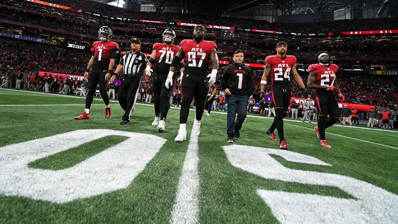 ATLANTA, GA – NOVEMBER 20: Referee Tra Blake (33) watches a replay during  the NFL game between the Chicago Bears and the Atlanta Falcons on November  20th, 2022 at Mercedes-Benz Stadium in