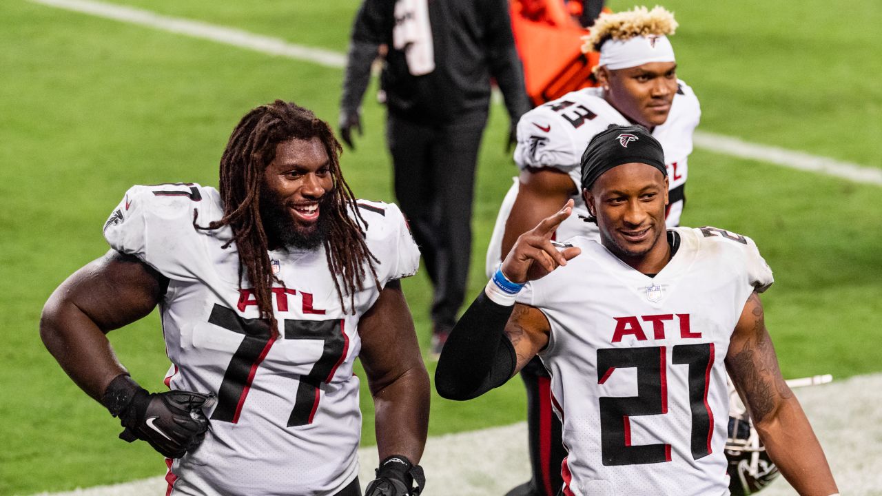 Dante Fowler, Hayden Hurst, Todd Gurley in all-black Falcons jerseys