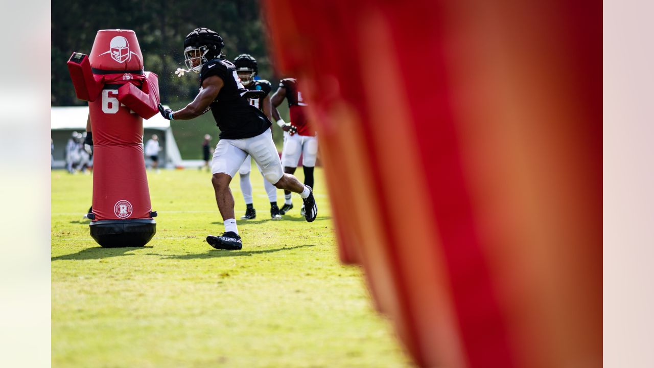 Atlanta Falcons linebacker Quinton Bell (56) works during the