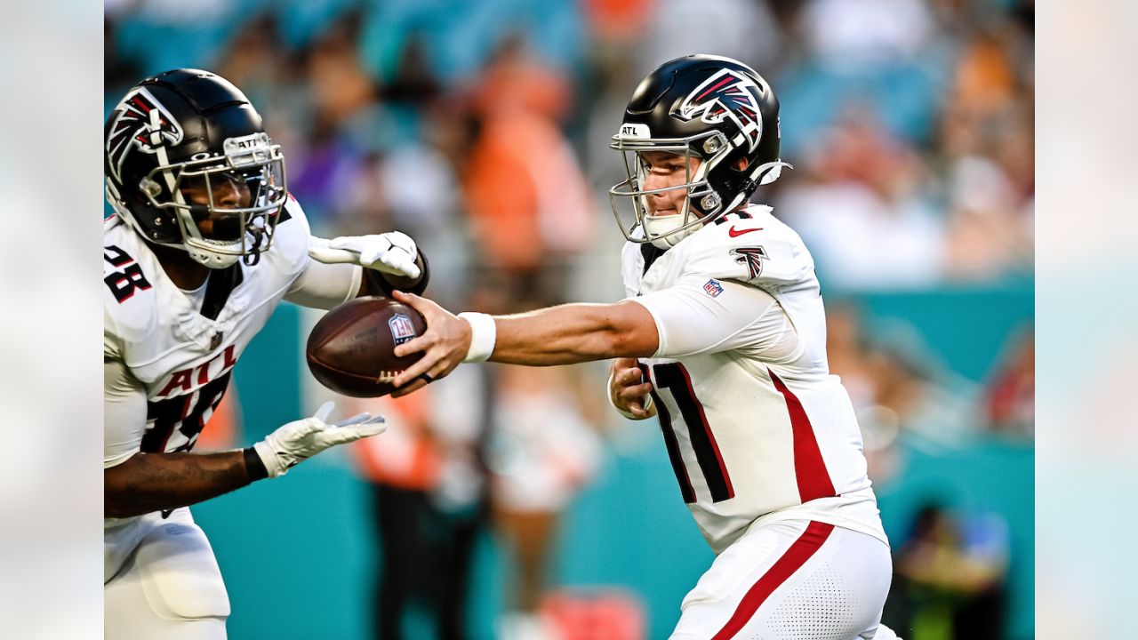 Atlanta Falcons quarterback Logan Woodside (11) runs with the ball