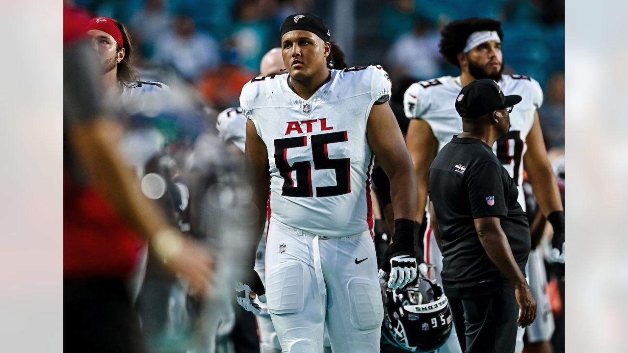 Atlanta Falcons quarterback Logan Woodside (11) runs with the ball against  the Miami Dolphins during an NFL pre-season football game, Friday, Aug. 11,  2023, in Miami Gardens, Fla. (AP Photo/Doug Murray Stock