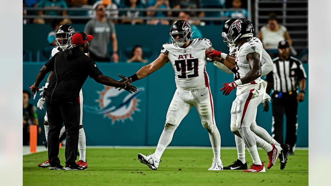 Atlanta Falcons quarterback Logan Woodside (11) runs with the ball against  the Miami Dolphins during an NFL pre-season football game, Friday, Aug. 11,  2023, in Miami Gardens, Fla. (AP Photo/Doug Murray Stock