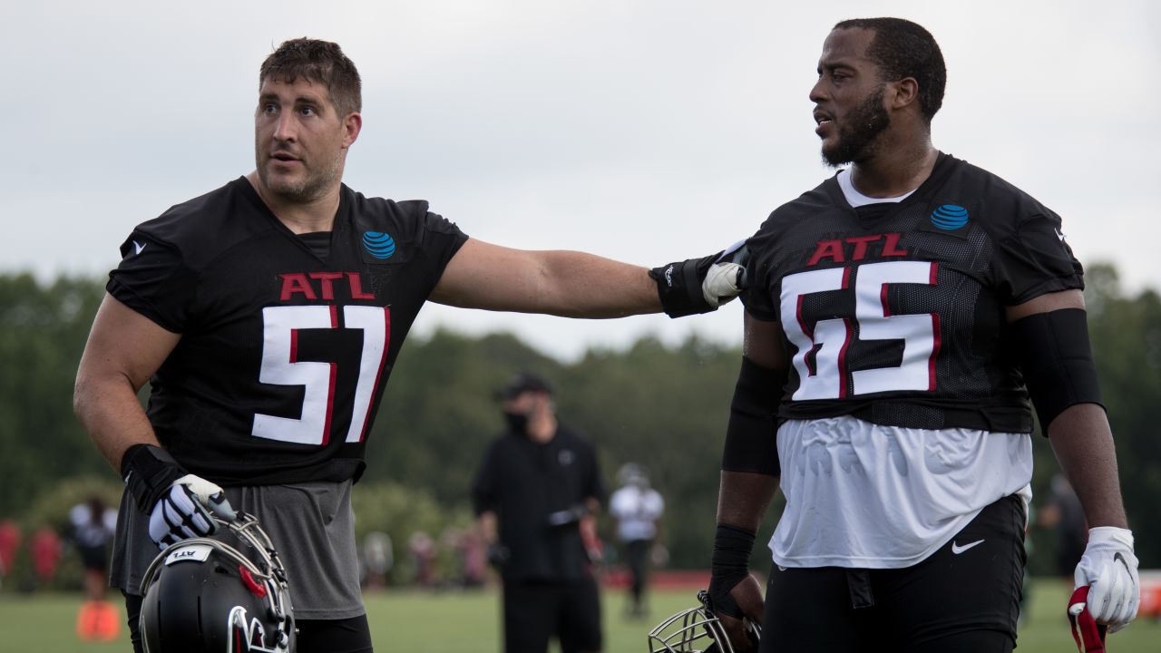 Atlanta Falcons linebacker Mykal Walker (3) and cornerback A.J. Terrell  (24) talk during a break in NFL football training camp at the team's  practice facility in Flowery Branch, Ga., Wednesday, Aug. 10