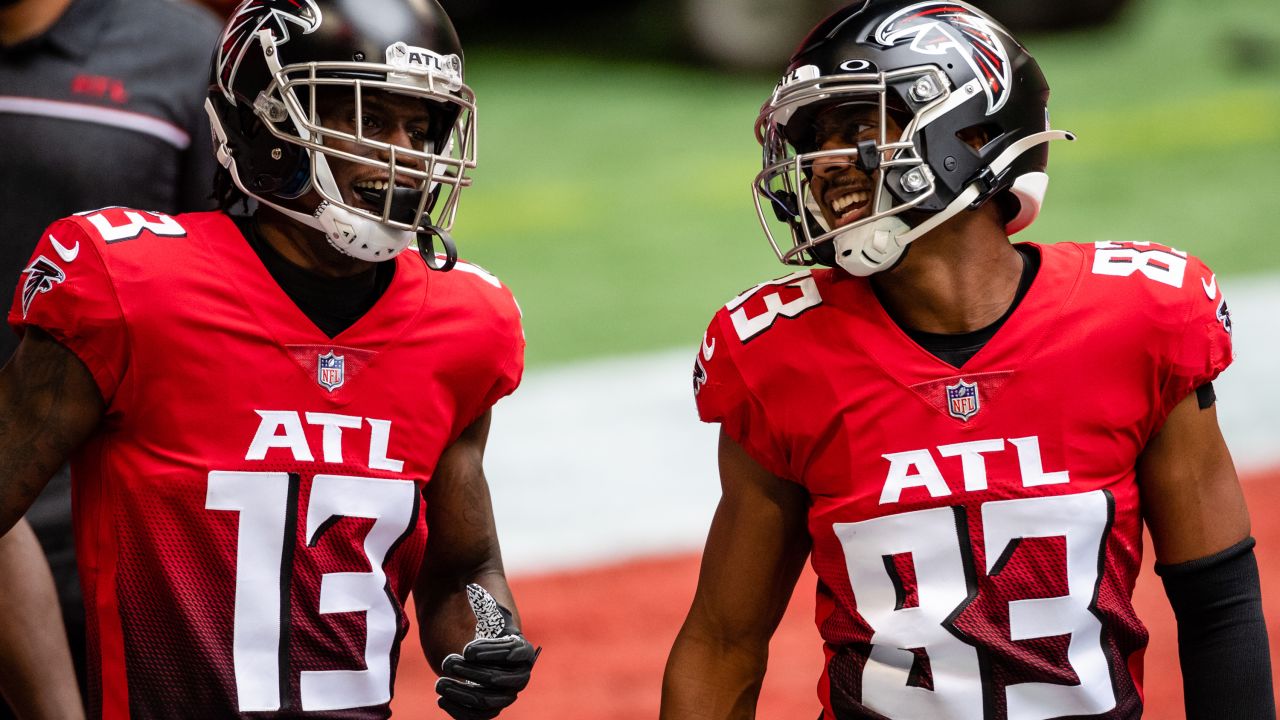 Atlanta Falcons wide receiver Christian Blake #13 runs out of the tunnel  during pregame against the …