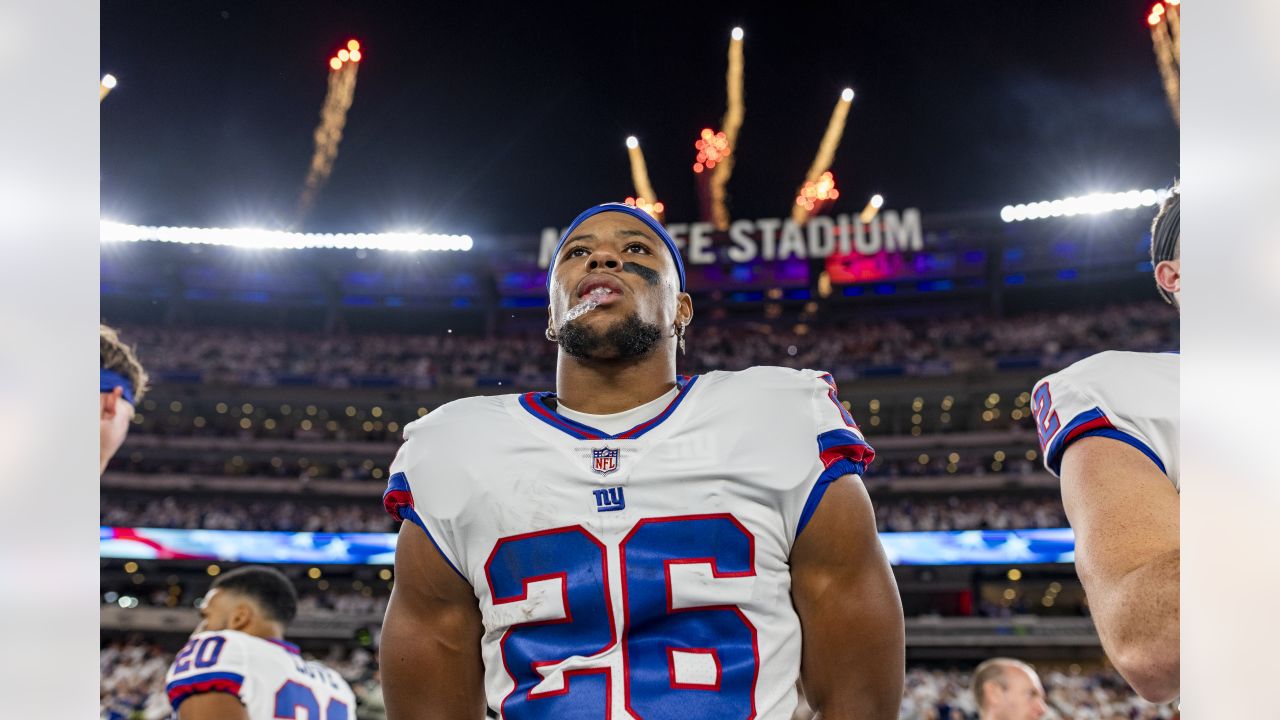 Somebody blinked: Giants' Saquon Barkley signs deal and reports to