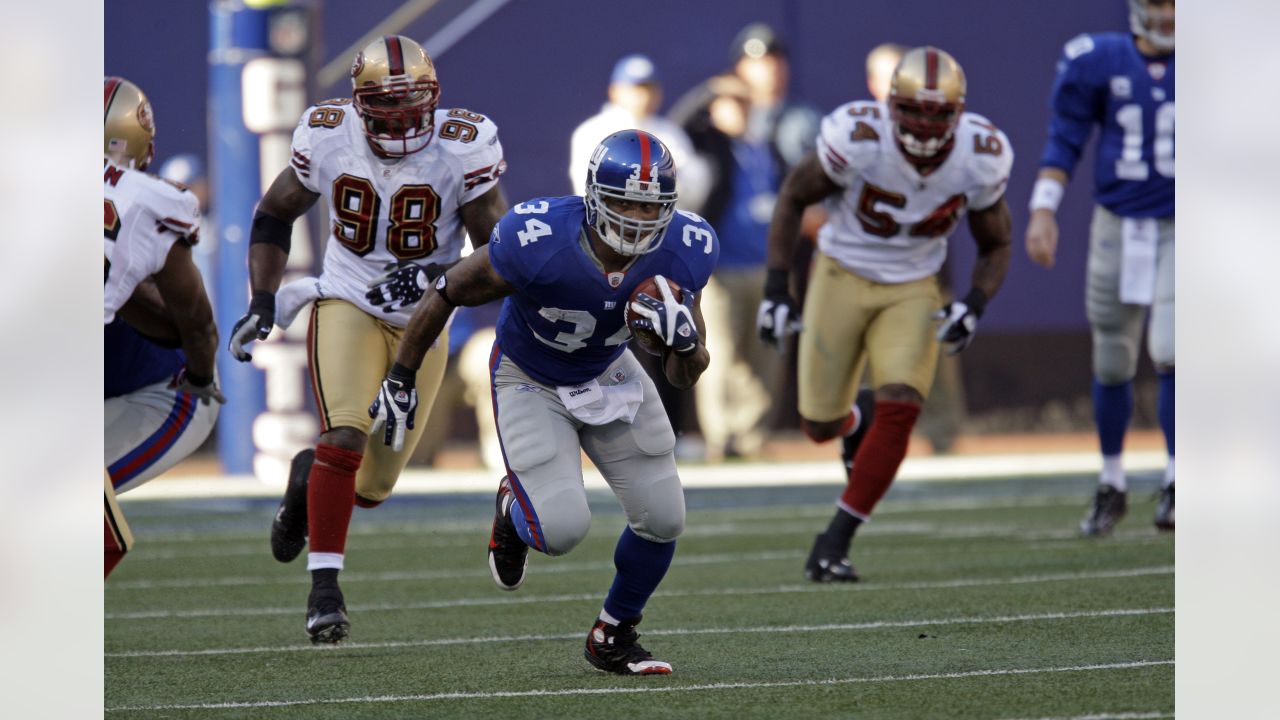 New York Giants running back Derrick Ward (34) waves off the officials  ruling that he was down by contact on a third and three in the fourth  quarter of the Giants loss