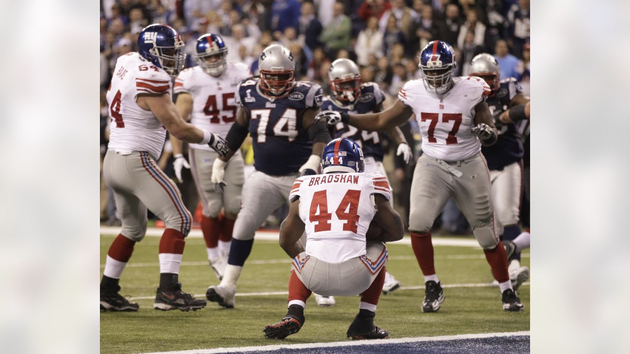 Running back Danny Woodhead (39) of the New England Patriots celebrates his  touchdown catch in the closing seconds of the first half against the New  York Giants during Superbowl XLVI on Sunday