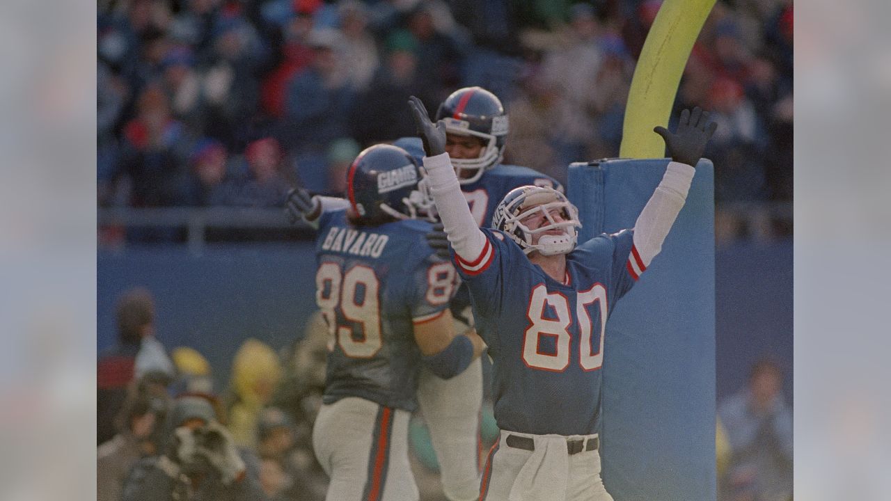 New York Giants Phil McConkey hauls in a 28-yard pass from quarterback Phil  Simms in the end zone as San Francisco 49ers Tim McKyer hangs on during  third quarter action at Giants