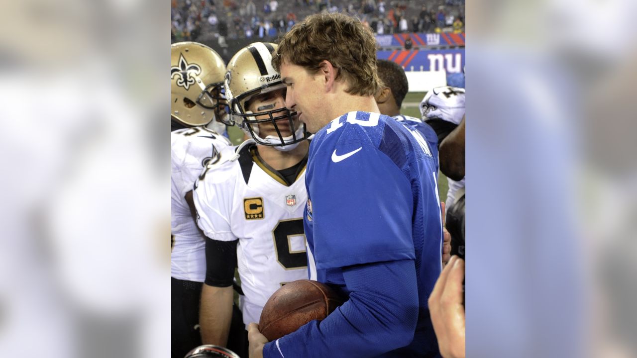 New Orleans Saints Drew Brees stretches on the sidelines before the game  against the New York Giants in week 4 of the NFL season at MetLife Stadium  in East Rutherford, New Jersey