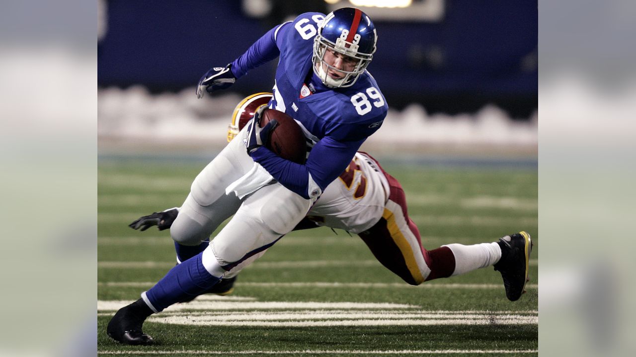 New York Giants wide receiver Isaiah Hodgins (18) runs with the ball  against the Washington Commanders during an NFL football game Sunday, Dec.  4, 2022, in East Rutherford, N.J. (AP Photo/Adam Hunger