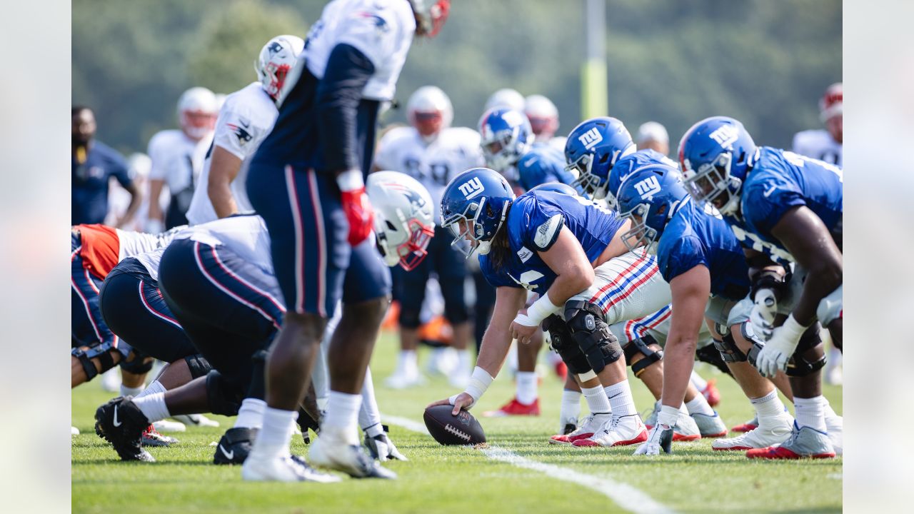 New York Giants running back Sandro Platzgummer makes a catch during a  joint NFL football practice with the New England Patriots, Thursday, Aug.  26, 2021, in Foxborough, Mass. (AP Photo/Steven Senne Stock