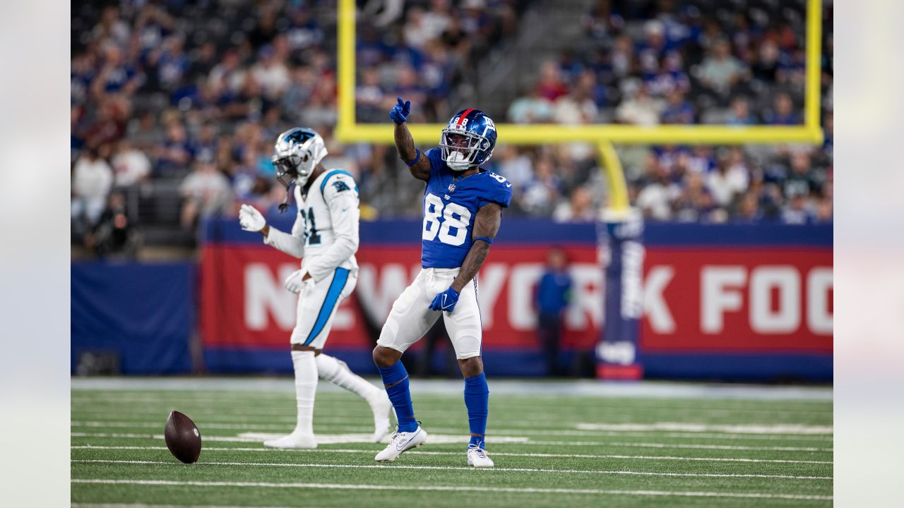 New York Giants wide receiver Collin Johnson (15) throws a shirt to fans  after the NFL football team's practice in East Rutherford, N.J., Friday,  Aug. 5, 2022. (AP Photo/Adam Hunger Stock Photo - Alamy