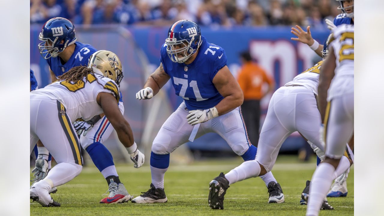 New York Giants Jason Pierre-Paul penetrates the offensive line and gets a  hand on Green Bay Packers Aaron Rodgers in the third quarter in week 12 of  the NFL season at MetLife