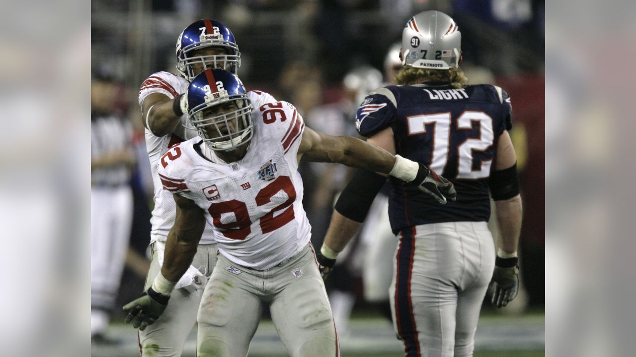 The New England Patriots' Randy Moss (81) can't pull in a pass against the New  York Giants' Corey Webster (23) in a 17-14 Giants victory in Super Bowl  XLII at University of