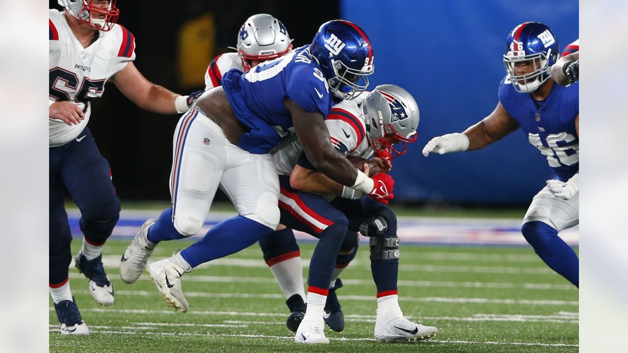 New England Patriots offensive tackle Trent Brown (77) looks on against the  New York Giants during an NFL preseason football game, Sunday, Aug. 29,  2021, in East Rutherford, N.J. (AP Photo/Adam Hunger