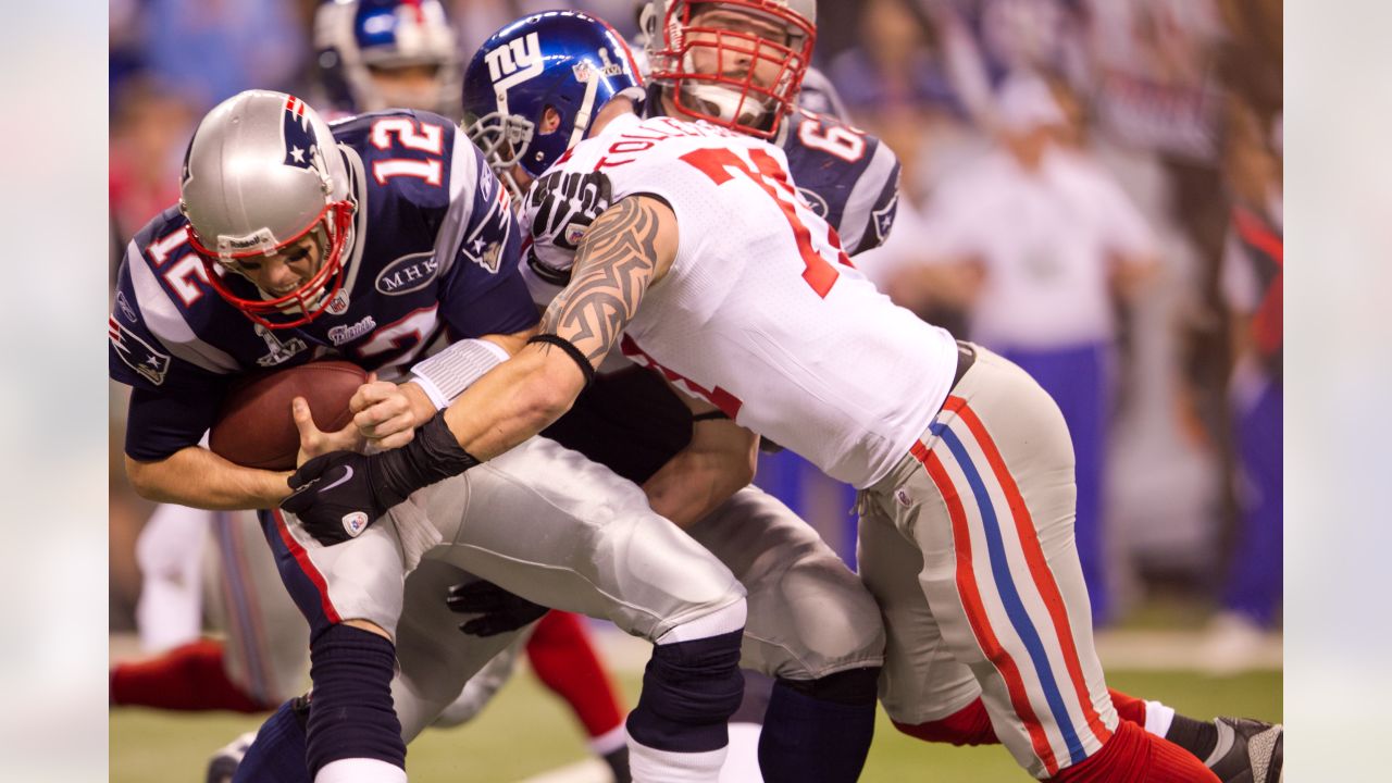 Buffalo Bills tackle Spencer Brown (79) walks off the field following a win  in an NFL football game against the New England Patriots, Sunday, Dec. 26,  2021, in Foxborough, Mass. (AP Photo/Stew