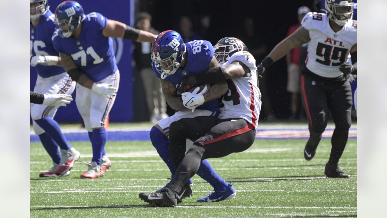 Atlanta Falcons running back Cordarrelle Patterson, below, is tackled by  New York Giants safety Xavier McKinney (29) during the first half of an NFL  football game, Sunday, Sept. 26, 2021, in East