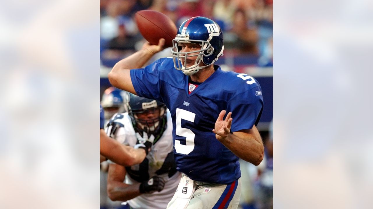 New York Giants Justin Tuck is double teamed as he tries to get to Seattle  Seahawks quarterback Matt Hasselbeck. The Giants defeated the Seahawks  44-6, at Giants Stadium in East Rutherford, New