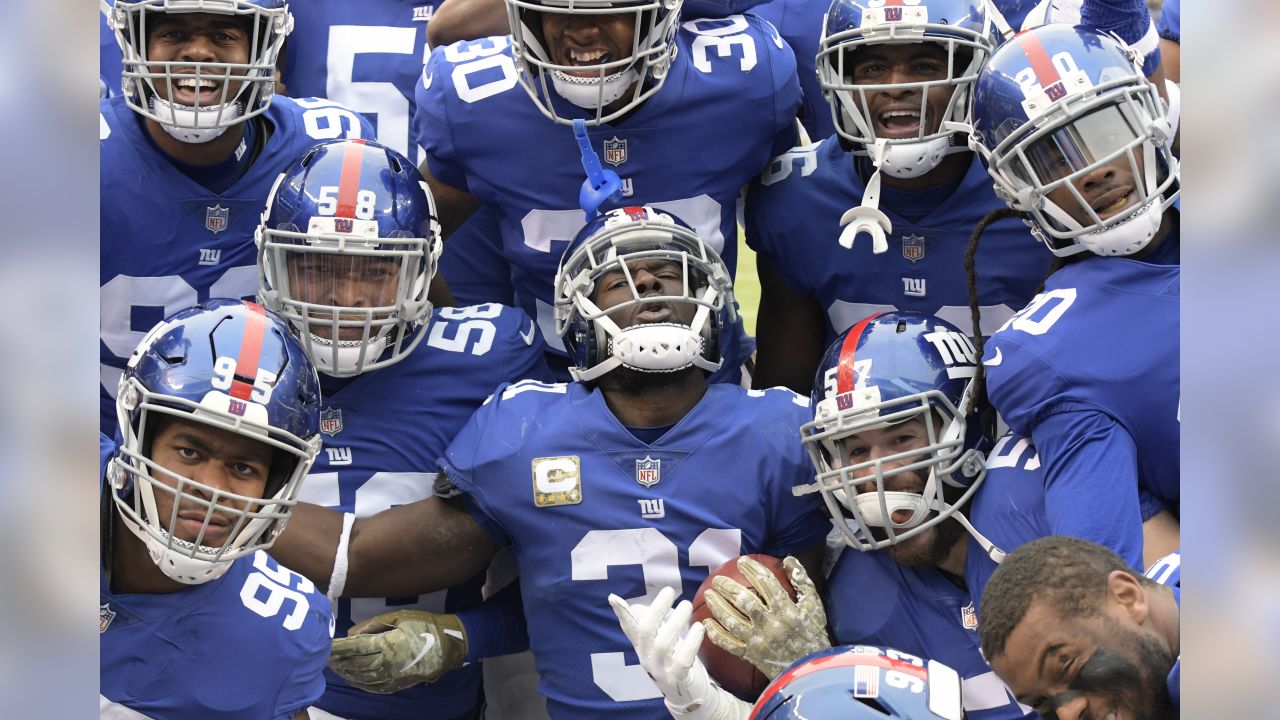 The Tampa Bay Buccaneers defense celebrates an interception during