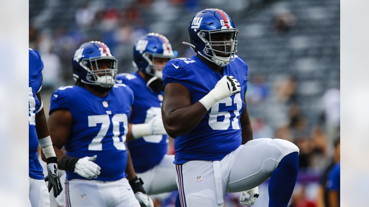 New York Giants offensive tackle Roy Mbaeteka (61) warms up before a  preseason NFL football game against the Cincinnati Bengals Sunday, Aug. 21,  2022, in East Rutherford, N.J. (AP Photo/John Munson Stock