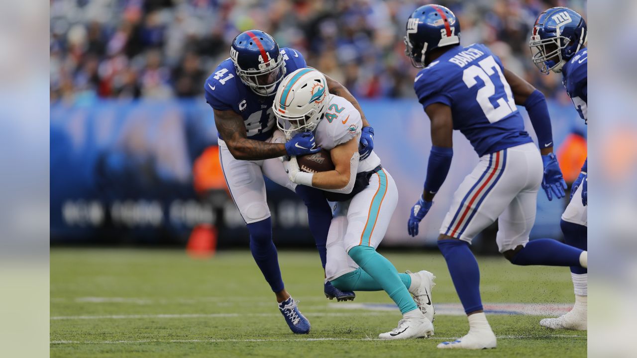 Game Recap: Eli Manning caps emotional day with 36-20 win over Dolphins