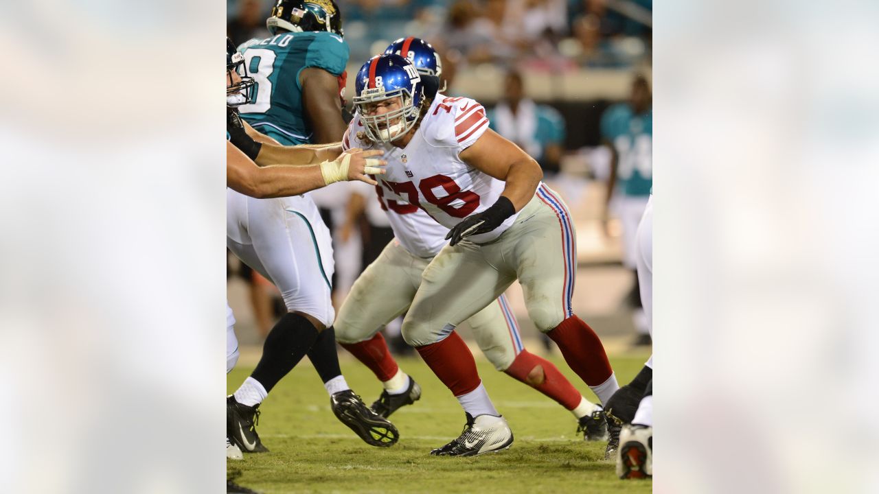 New York Giants defensive tackle Markus Kuhn (78) is fired up after an  interception by a teammate in an NFL football game between the New York  Giants and Dallas Cowboys on Sunday