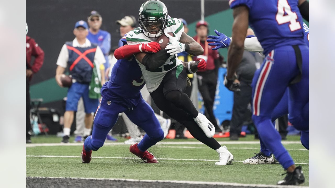 New York Jets' James Robinson (23) runs past Buffalo Bills safety Damar  Hamlin (3) for a touchdown during the second half of an NFL football game,  Sunday, Nov. 6, 2022, in East