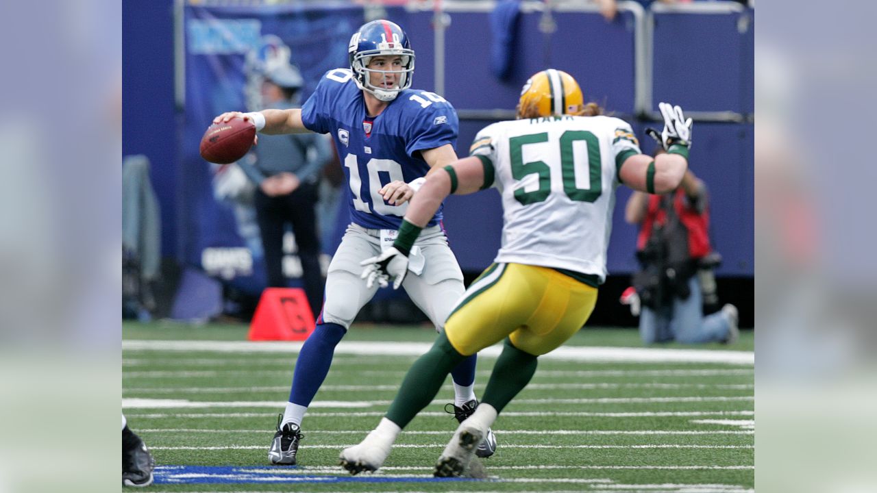 Green Bay Packers Clay Matthews hits New York Giants Eli Manning in the  first quarter in week 13 of the NFL season at MetLife Stadium in East  Rutherford, New Jersey on December