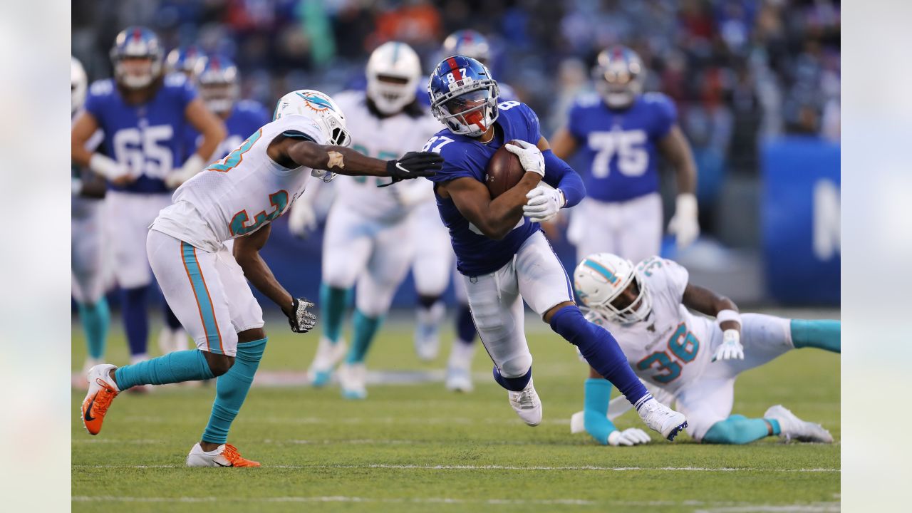 New York Giants wide receiver Sterling Shepard (87) is brought down against  the Miami Dolphins in the first half of an NFL football game, Sunday, Dec.  15, 2019, in East Rutherford, N.J. (