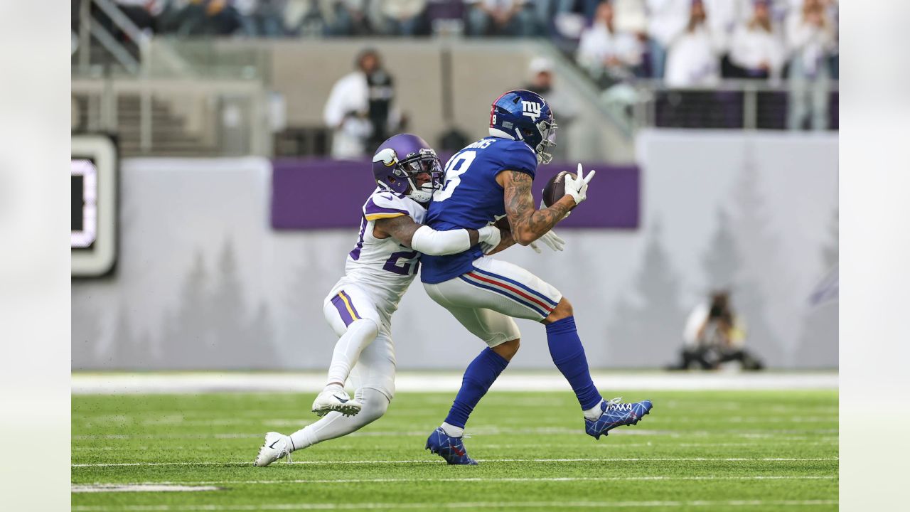 New York Giants wide receiver Isaiah Hodgins (18) runs with the ball  against the Washington Commanders during an NFL football game Sunday, Dec.  4, 2022, in East Rutherford, N.J. (AP Photo/Adam Hunger