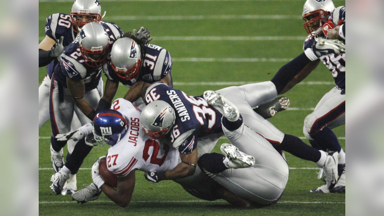 New England Patriots James Sanders and Asante Samuel celebrate