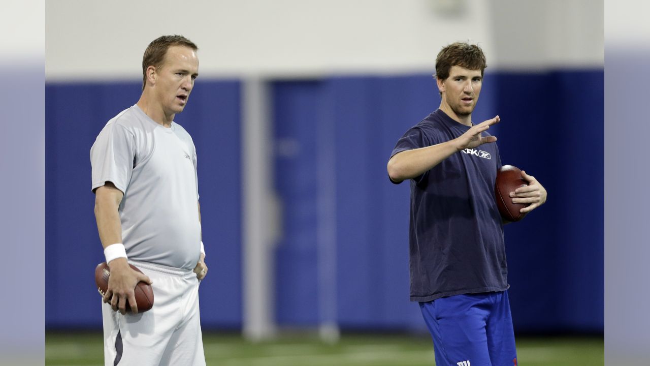 New York Giants Eli Manning throws a pass during week 1 at Giants Stadium  in East Rutherford, New Jersey on September 10, 2006. Peyton Manning and Eli  Manning played each other for