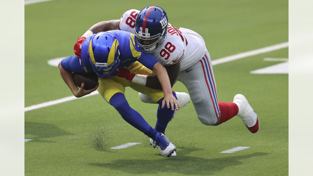 Atlanta Falcons running back Cordarrelle Patterson, below, is tackled by  New York Giants safety Xavier McKinney (29) during the first half of an NFL  football game, Sunday, Sept. 26, 2021, in East