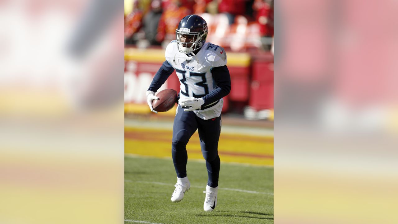 Tennessee Titans running back Derrick Henry speaks to the media following  an NFL wild-card playoff football game against the New England Patriots,  Saturday, Jan. 4, 2020, in Foxborough, Mass. (AP Photo/Steven Senne