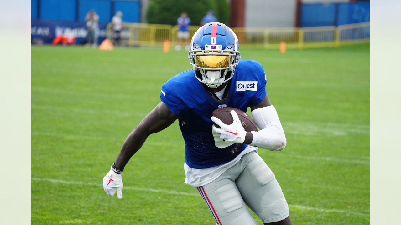 New York Giants quarterback Tommy DeVito (5) looks to pass during