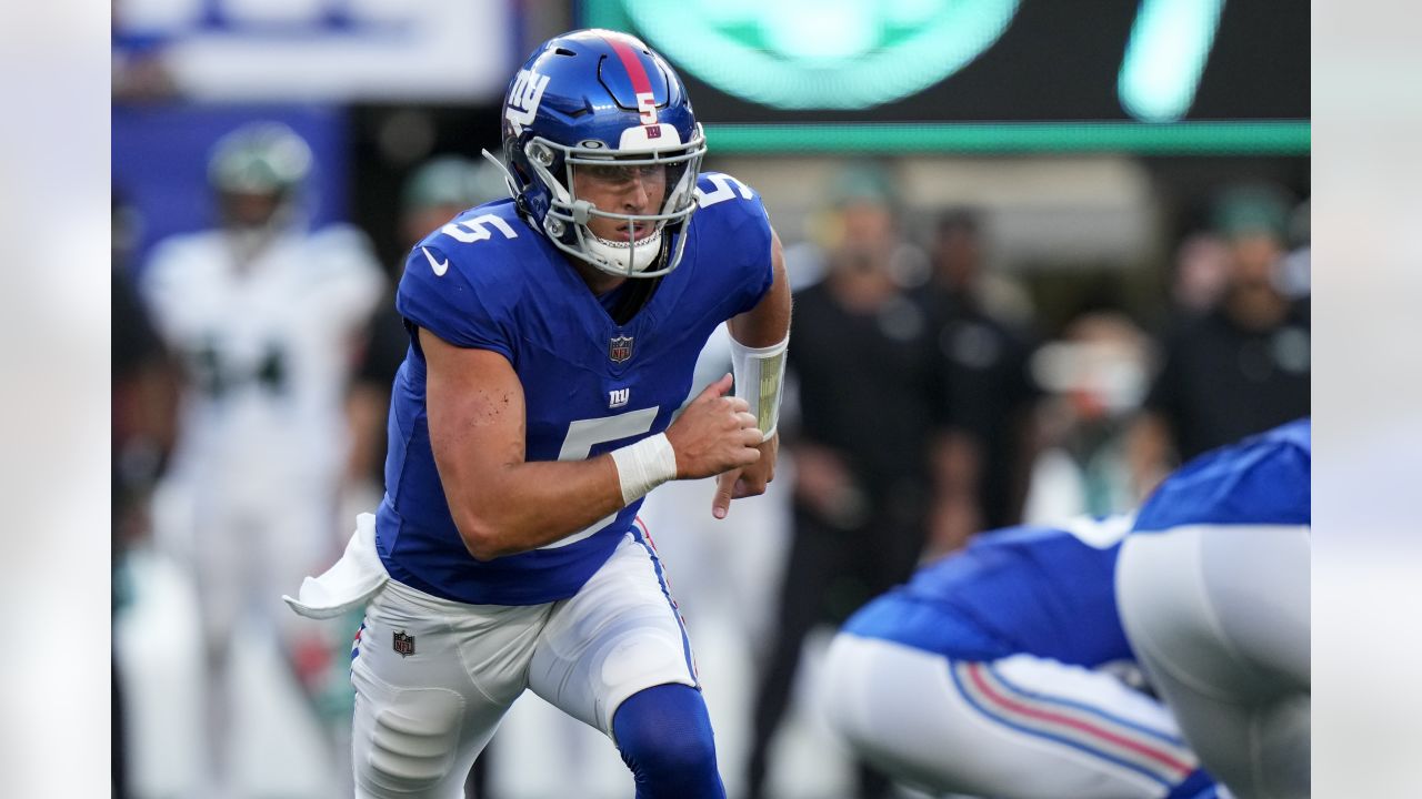 New York Jets quarterback Aaron Rodgers (8) calls out a play to his  teammates during the first half of an NFL preseason football game against  the New York Giants, Saturday, Aug. 26