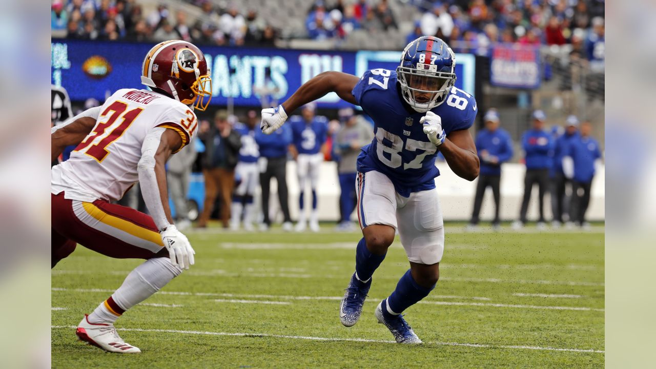 New York Giants wide receiver Sterling Shepard (87) celebrates with his  team after a 3-yard touchdown reception over the Washington Redskins during  the first half of an NFL game at FedEx Field