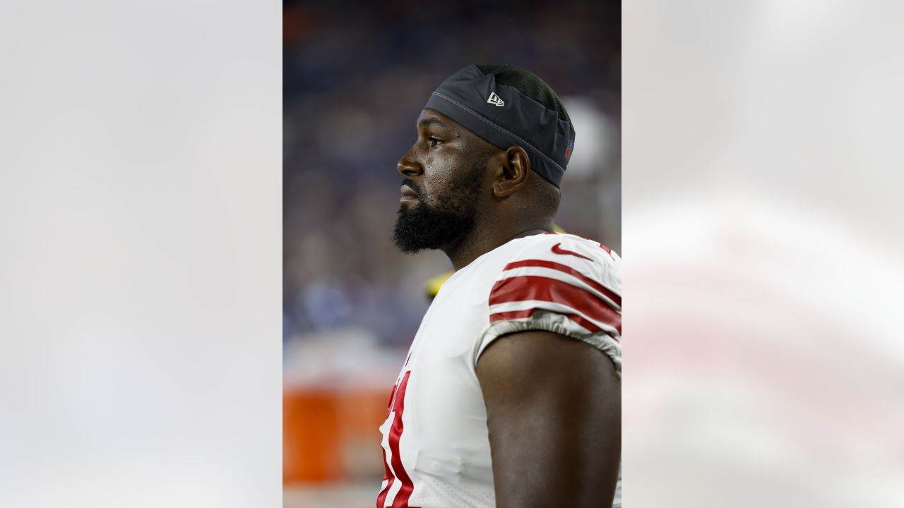 New York Giants offensive tackle Roy Mbaeteka (61) on the sideline during  the first half of an NFL football game against the New York Giants,  Thursday, Aug. 11, 2022, in Foxborough, Mass. (