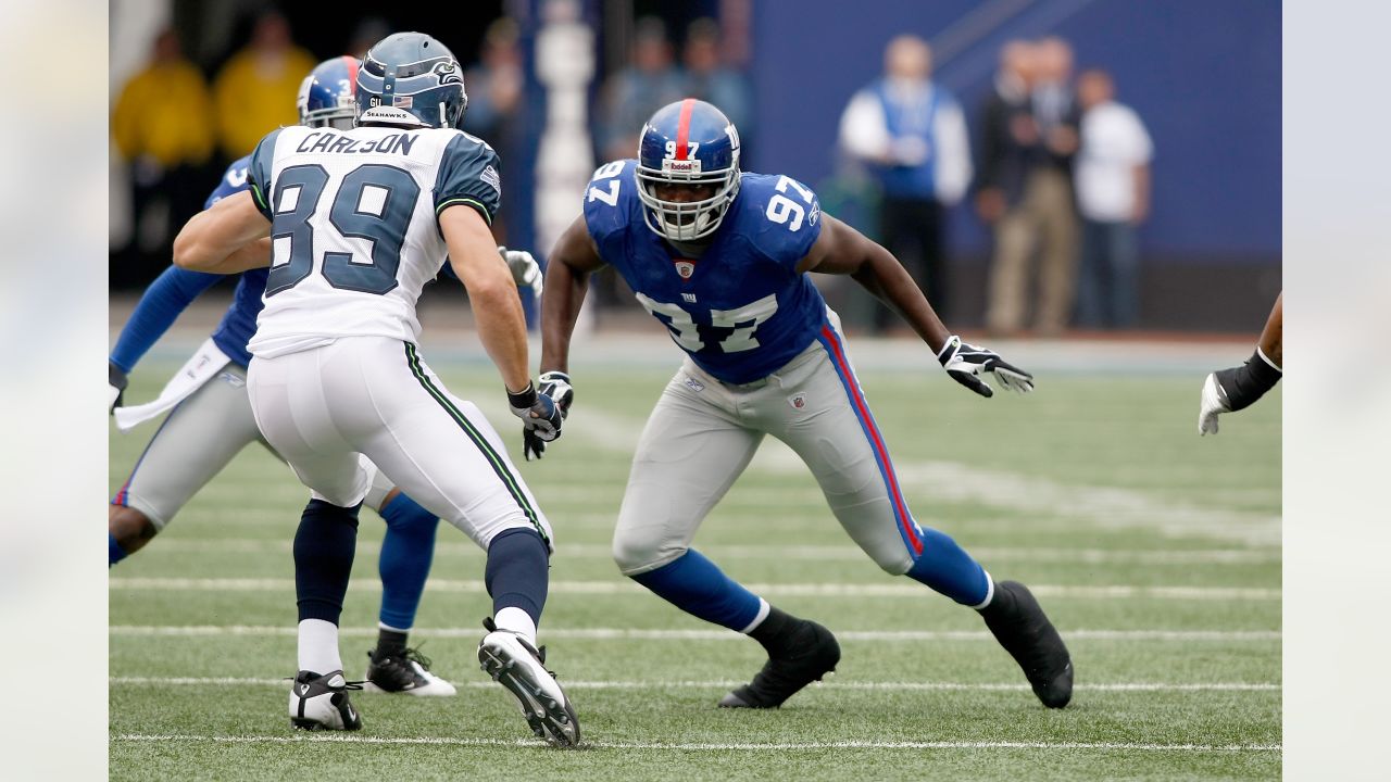 Buffalo Bills Marshawn Lynch has his face mask pushed by New York Jets  Calvin Pace (97) in the second quarter at Giants Stadium in East  Rutherford, New Jersey on December 14, 2008. (