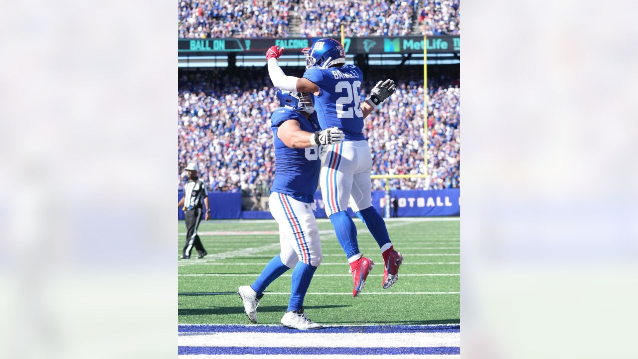 New York Giants guard Ben Bredeson (68) celebrates while leaving