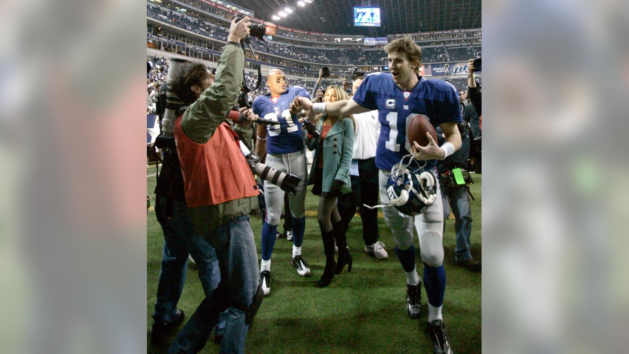 Dallas Cowboys' Roy Williams (11) and Tennessee Titans' Vince Young (10)  chat on the field after their pre-season game at Cowboys Stadium in  Arlington on Friday, August 21, 2009. Though playing for