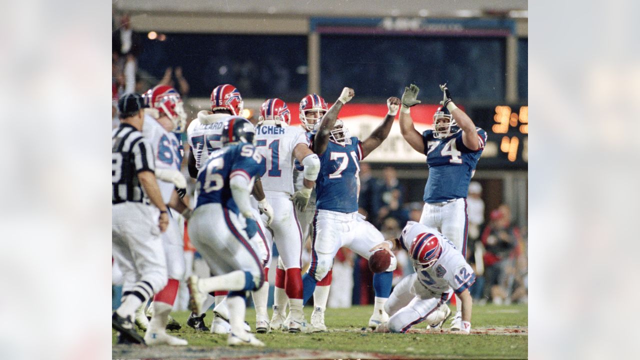 Rare Photo Of Jim Kelly Holding A Young Josh Allen