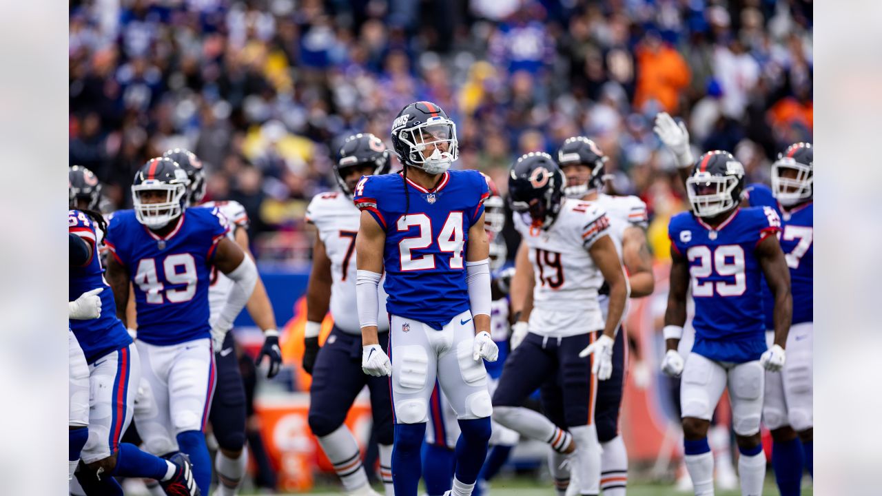 New York Giants safety Dane Belton (24) and linebacker Tomon Fox