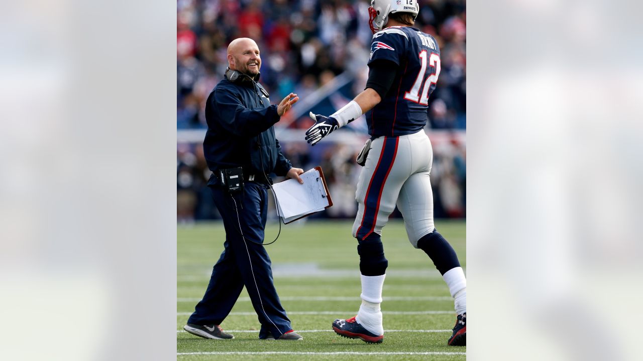 New England Patriots quarterback Tom Brady greets members of the U.S.  military along the sideline before an NFL football game against the Atlanta  Falcons, Sunday, Oct. 22, 2017, in Foxborough, Mass. (AP