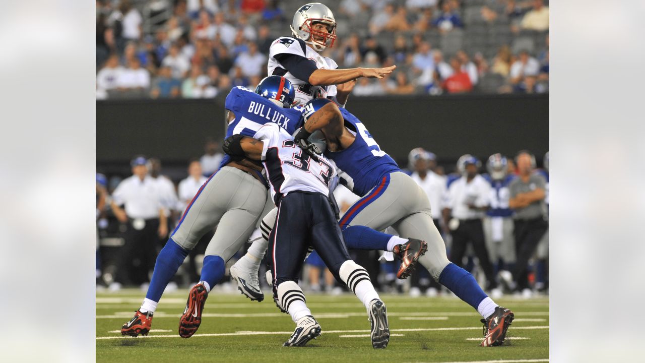 29 December 2007: New England Patriots Tom Brady #12 leaves the field after  the game against the New York Giants at Giants Stadium in East Rutherford,  NJ. The Patriots beat the Giants