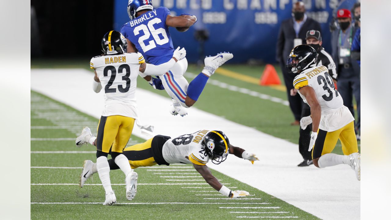 Pittsburgh Steelers cornerback Joe Haden (23) encourages fans