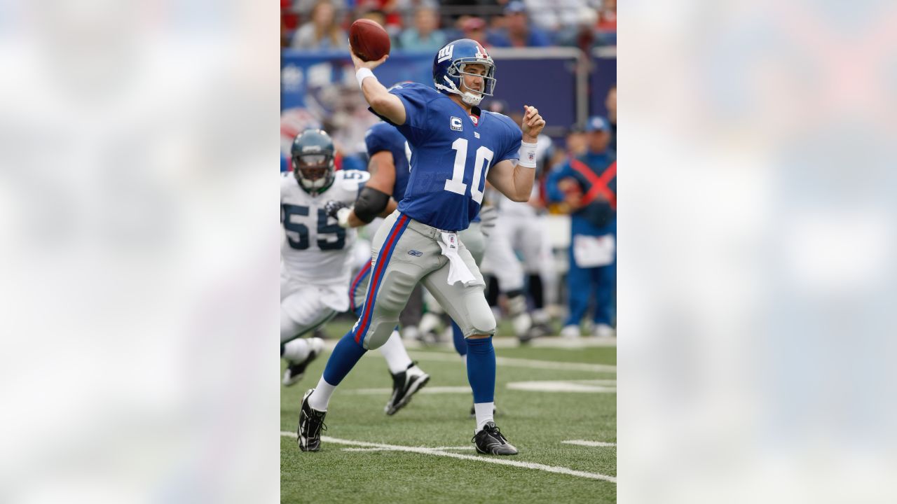 New York Giants Eli Manning throws a pass during week 1 at Giants Stadium  in East Rutherford, New Jersey on September 10, 2006. Peyton Manning and Eli  Manning played each other for